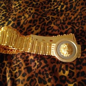 40 inch gold tone belt with lion head buckle